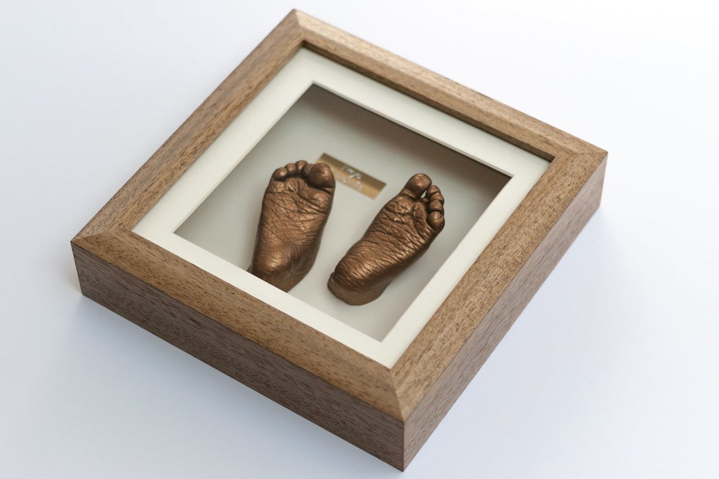 Silver baby feet casting preserved in beautiful frame - baby casting service Guildford