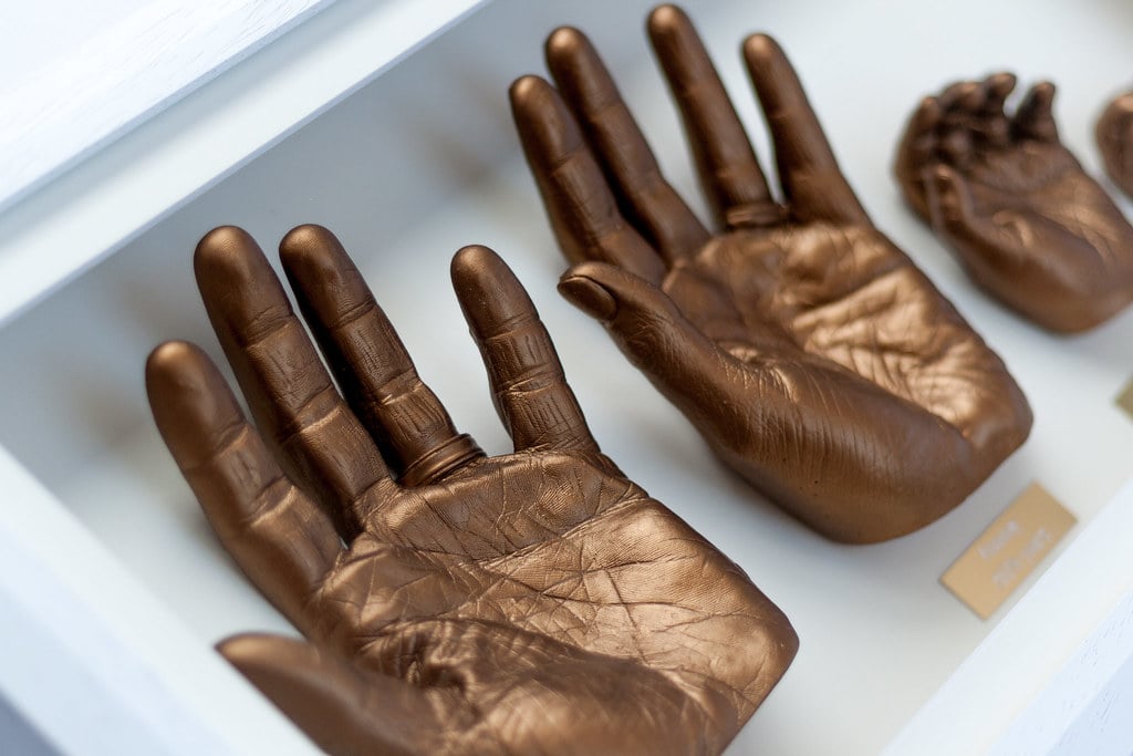 Gold baby foot casting in frame with name plate - baby casting keepsake Woking