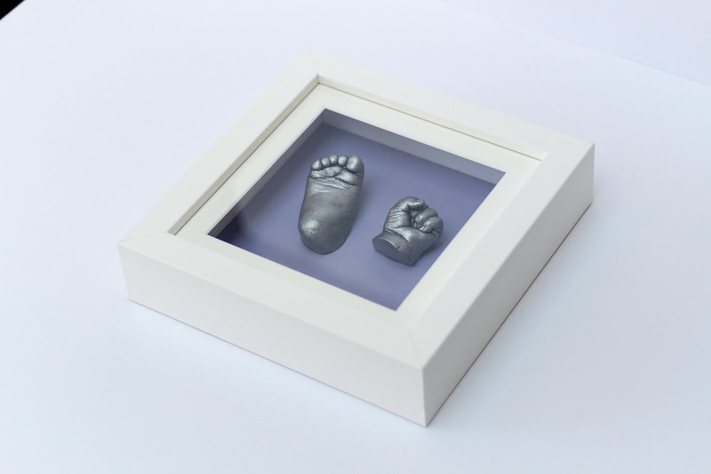 Gold baby hand casting in elegant frame - Casting Impressions Guildford