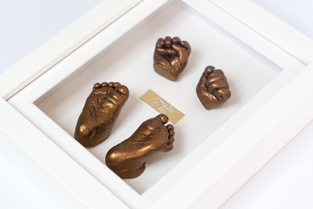 Silver baby hand casting in elegant frame - casting specialist Guildford