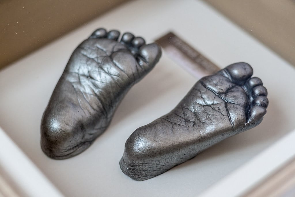 Silver baby feet casting in decorative frame with photo - 3D life casting