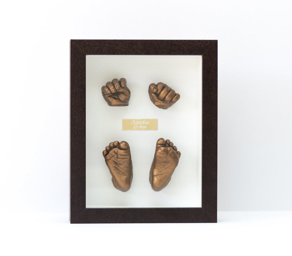 Gold baby feet casting with name plate in decorative frame - 3D casting service