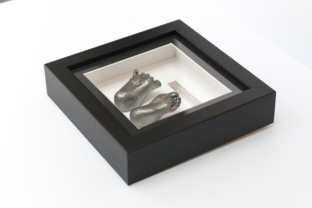 Silver baby feet casting preserved in beautiful frame - baby casting service Guildford