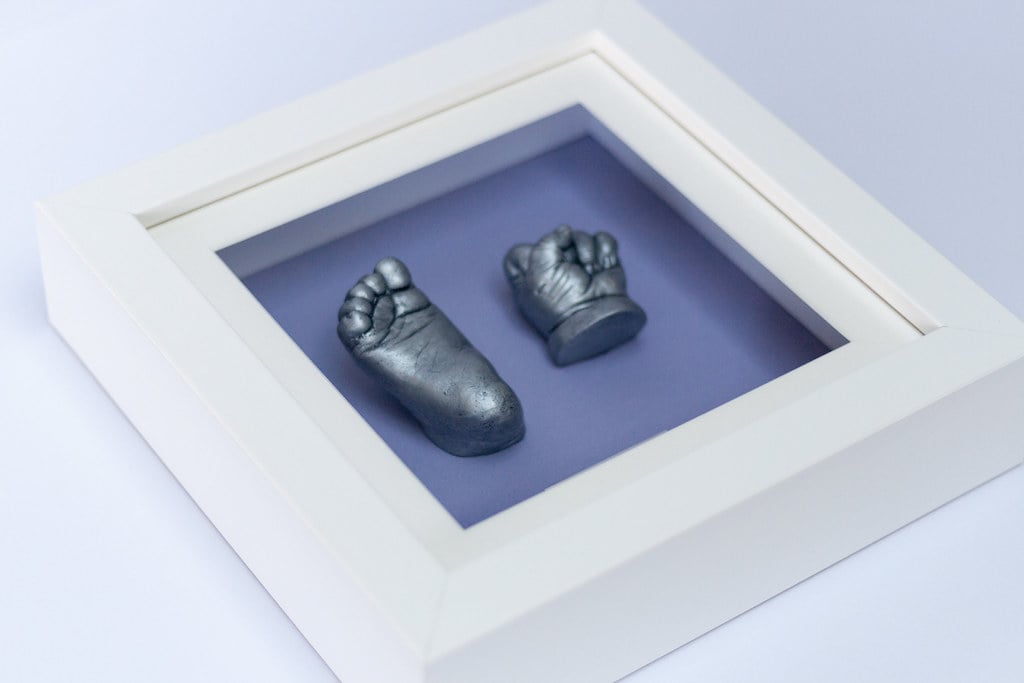 Silver baby foot casting in decorative frame with photo - 3D casting specialist