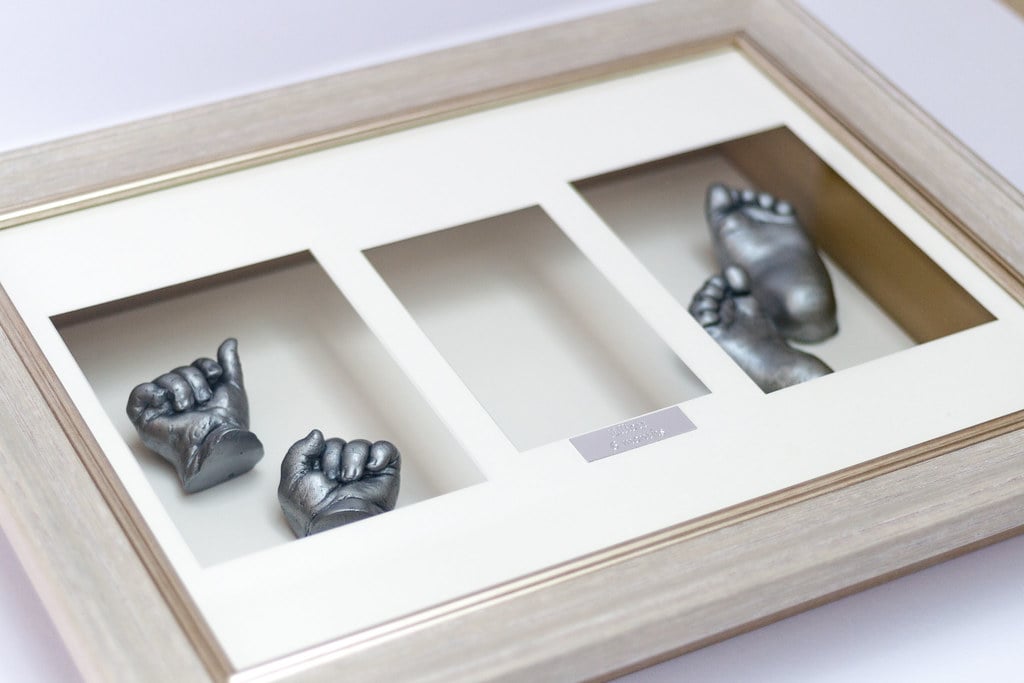 Silver baby foot casting with photo in decorative frame - professional casting