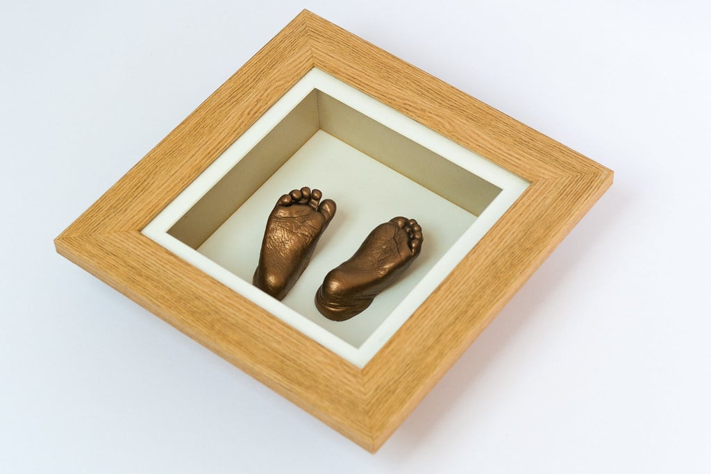 Gold baby foot casting in decorative frame - professional 3D casting