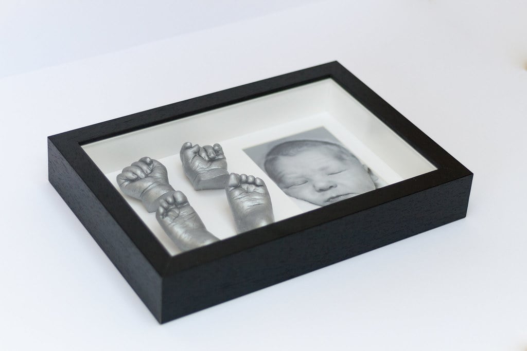 Gold baby hand casting preserved in beautiful frame - 3D casting specialist