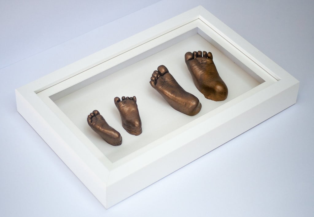 Bronze baby hand casting in elegant frame - baby casting keepsake