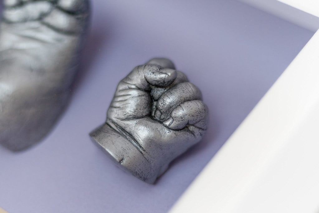 Silver baby hand casting preserved in beautiful frame - Woking casting specialist